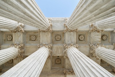 Designing Self-Reflective Dual-Agent Governance Systems with Constitutional AI for Secure and Compliant Financial Operations